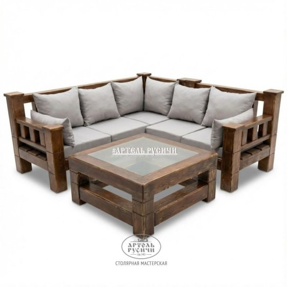 Угловой диван из массива дерева с мягкими подушками и журнальный столик в стиле лофт 