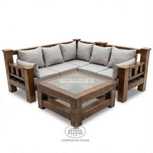 Угловой диван из массива дерева с мягкими подушками и журнальный столик в стиле лофт 