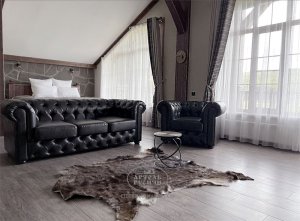 Отель Deer Farm, номер люкс. Кровать, балки из массива дерева производство "Артели "Русичи"