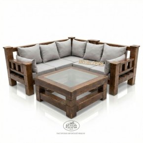 Угловой диван из массива дерева с мягкими подушками и журнальный столик в стиле лофт 